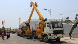 Nieuwe 6X4 HOWO flatbed truck gemonteerde kraan telescopische boom truck