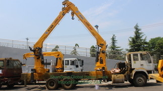Nieuwe 6X4 HOWO flatbed truck gemonteerde kraan telescopische boom truck