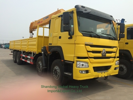Nieuwe 6X4 HOWO flatbed truck gemonteerde kraan telescopische boom truck